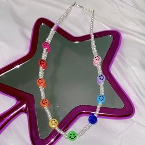 Trendy rainbow happy face beaded necklace.